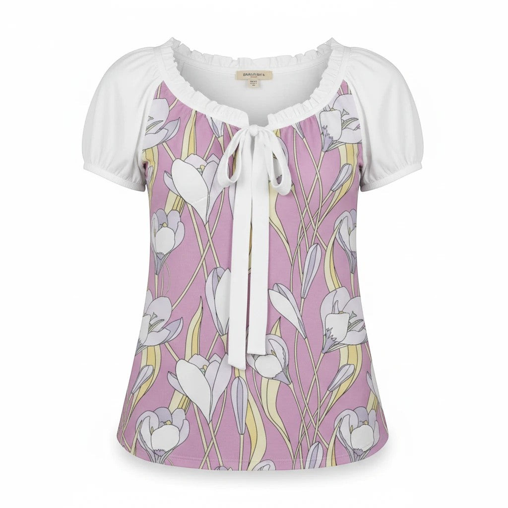 Sea Dragon Dreams floral puff-sleeve blouse with a pink and white crocus pattern and a front tie-neck detail.