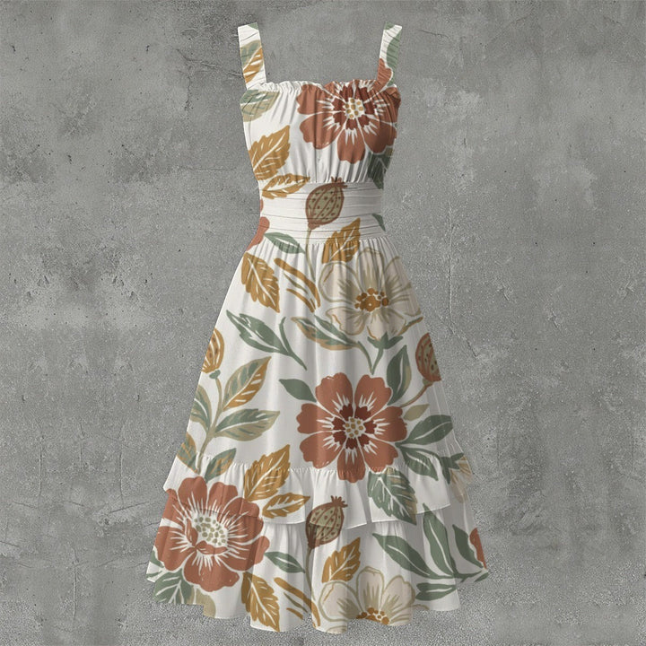 Sea Dragon Dreams sleeveless milk silk dress with a floral print, ruched bust, and a playful ruffled hem.