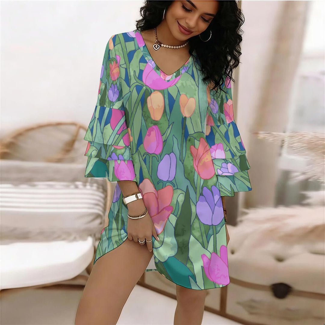 Sea Dragon Dreams floral print V-neck dress with layered ruffle sleeves, featuring a vibrant tulip pattern.