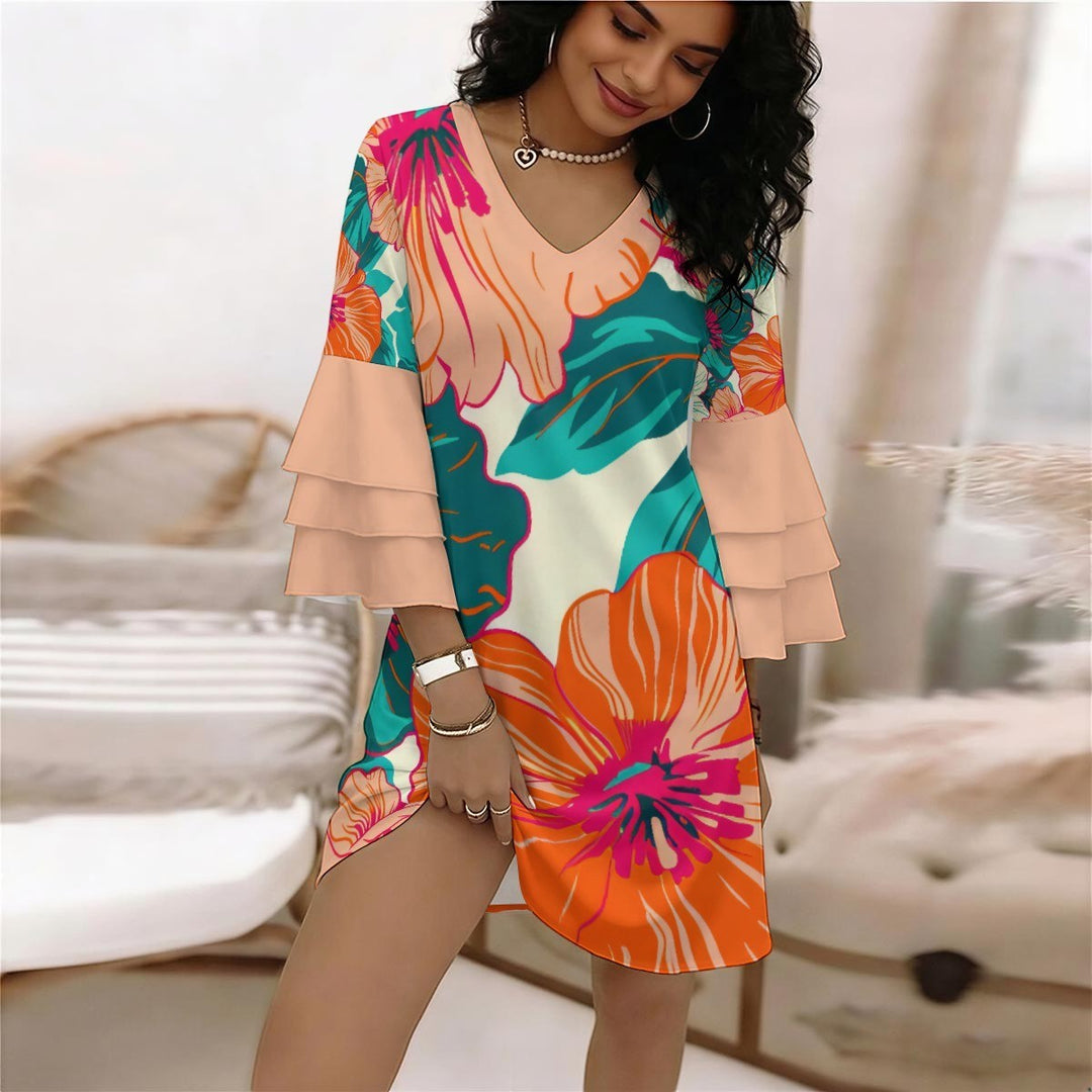 Sea Dragon Dreams floral V-neck dress with layered ruffle sleeves in vibrant orange, teal, and cream polyester fabric.