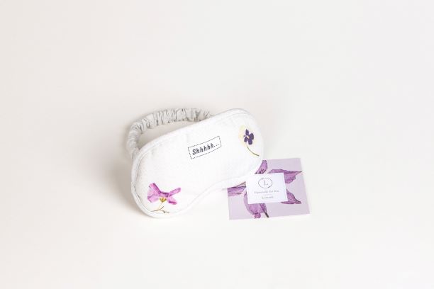 Sea Dragon Dreams sleep eye mask with floral print and Shhhhh text, accompanied by a small gift card