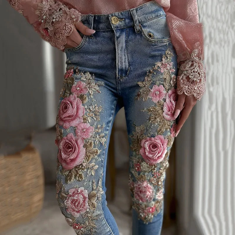 Sea Dragon Dreams blue stretch denim jeans featuring 3D pink floral embroidery and straight-leg silhouette