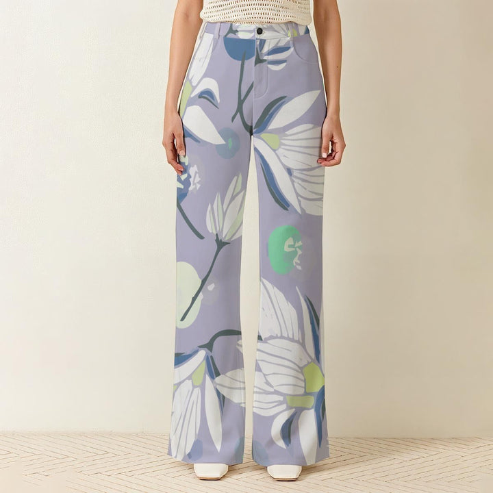 Sea Dragon Dreams high-waisted wide-leg pants in light purple with a large white and green floral print.
