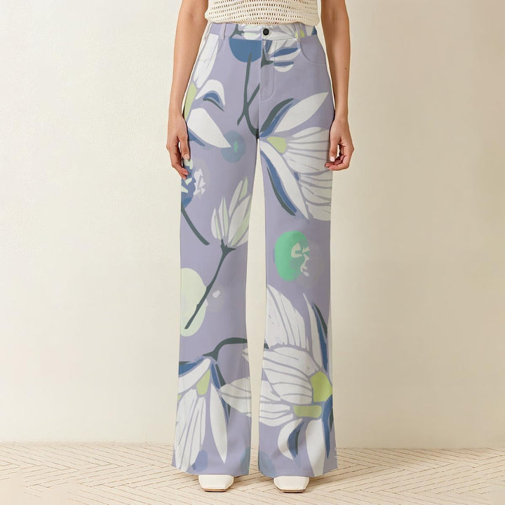 Sea Dragon Dreams high-waisted wide-leg pants in light purple with a large white and green floral print.