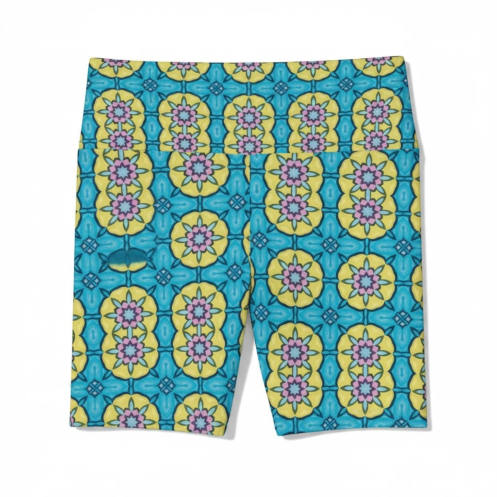 Sea Dragon Dreams women's workout shorts in blue and yellow with a whimsical circle flower pattern and stretch fabric.