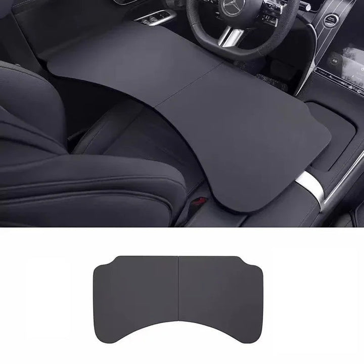 Sea Dragon Dreams black folding car steering wheel table used as a portable laptop desk or food tray in a vehicle.