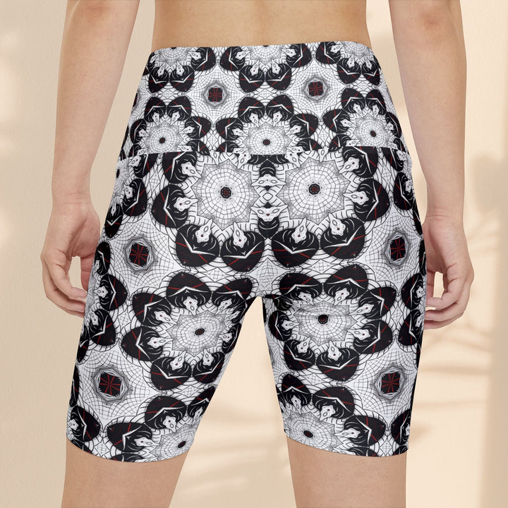 Sea Dragon Dreams women's workout shorts featuring a black and white geometric mandala pattern in polyester fabric.