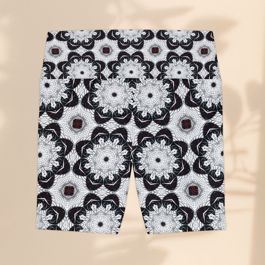 Sea Dragon Dreams women's workout shorts in black and white with a geometric mandala pattern and polyester fabric.