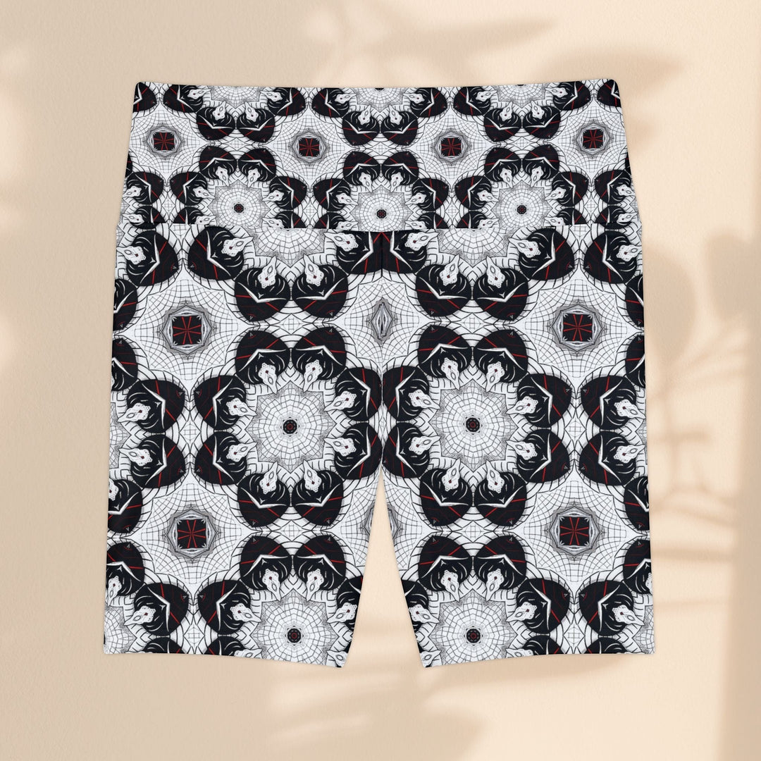 Sea Dragon Dreams workout shorts in black and white with a geometric floral pattern and comfortable high waistband.