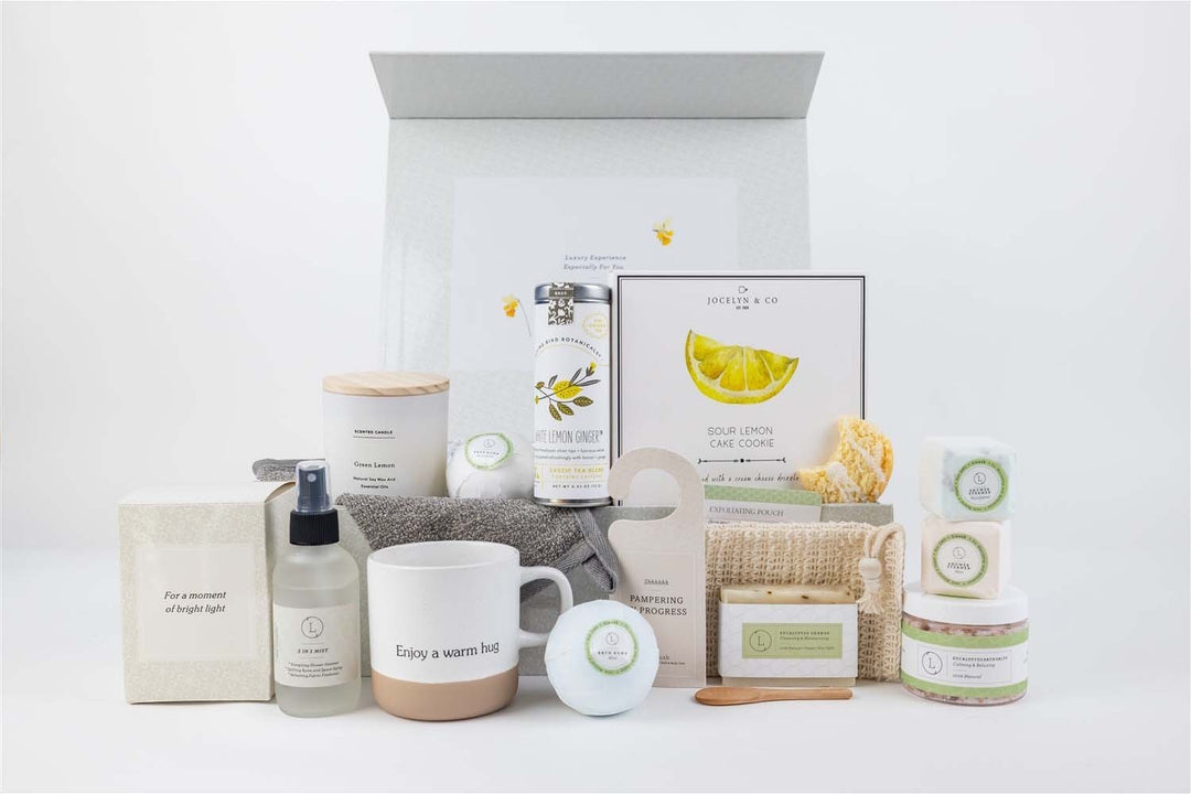 Sea Dragon Dreams get well soon gift basket featuring a ceramic mug, scented candle, bath bombs, and spa essentials.