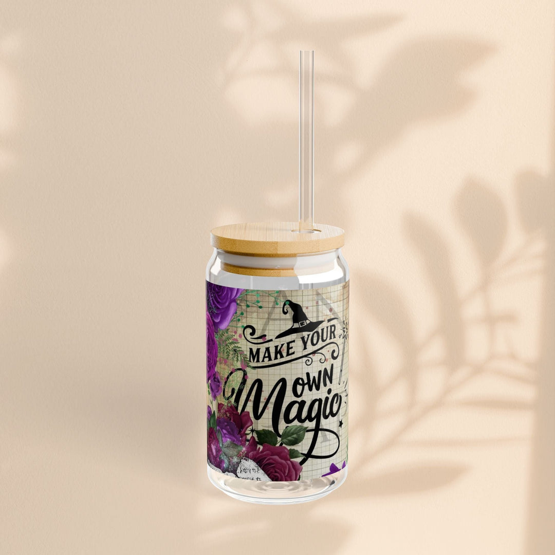 Sea Dragon Dreams 16oz clear glass sipper with bamboo lid, straw, and Make Your Own Magic floral witchy design.