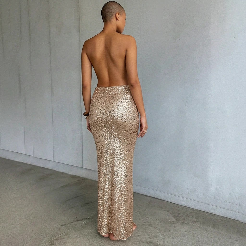 Sea Dragon Dreams gold sequin maxi beach cover-up skirt worn by a model, featuring a shimmering floor-length design.