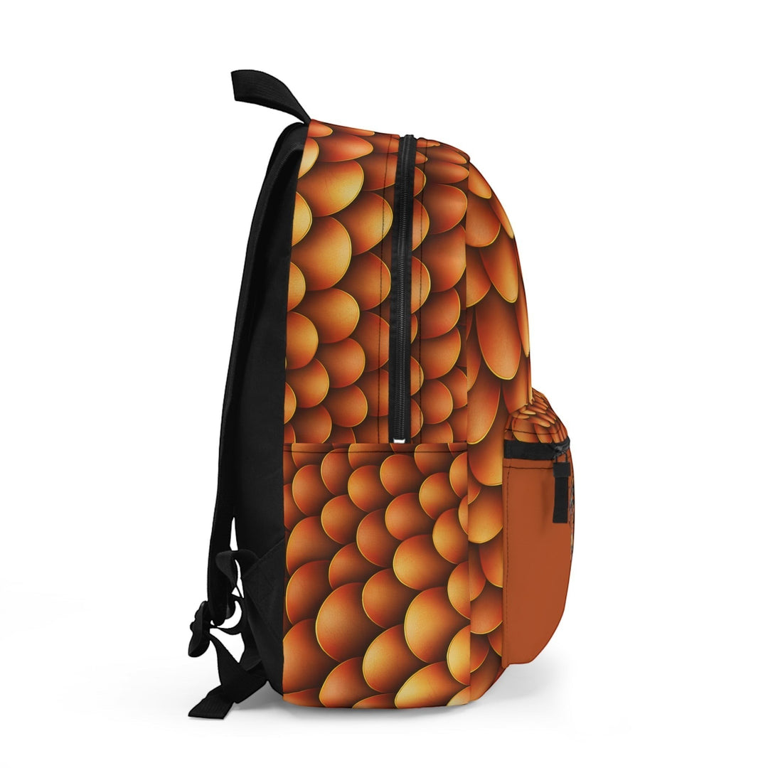 Sea Dragon Dreams backpack featuring a shimmering golden dragon scale pattern on water-resistant polyester fabric.