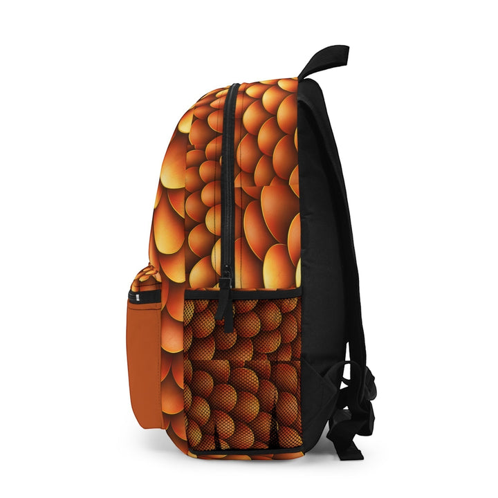 Sea Dragon Dreams backpack featuring a vibrant golden dragon scale pattern on water-resistant polyester fabric.