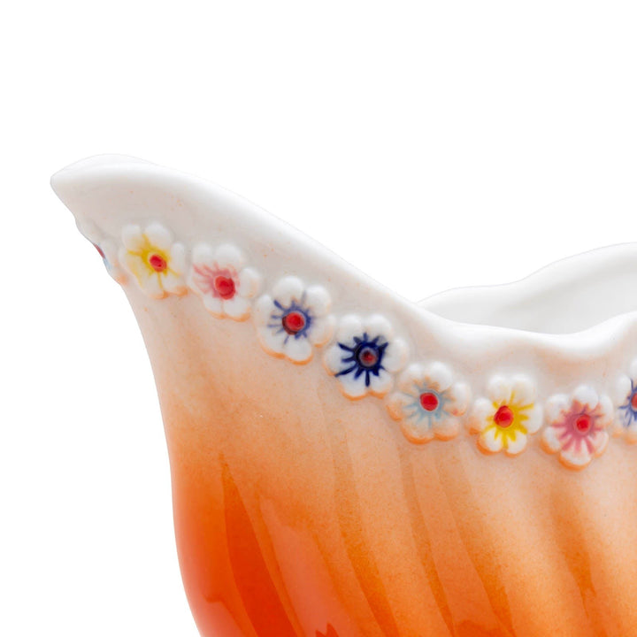 Sea Dragon Dreams BarConic goldfish tiki mug featuring hand-painted orange ceramic and delicate floral rim detail.