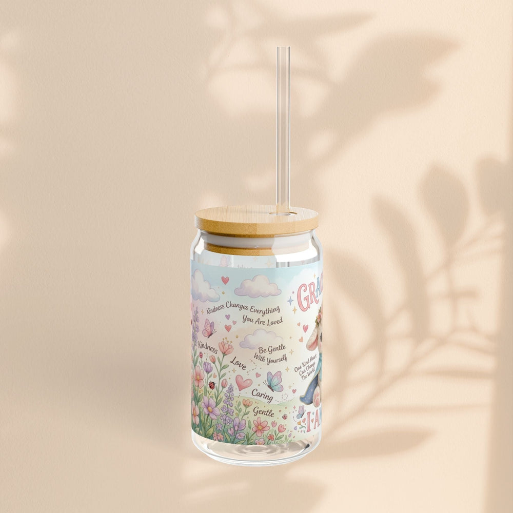 Sea Dragon Dreams 16oz glass sipper featuring a Grace Lamb illustration, floral motifs, and kindness affirmations.