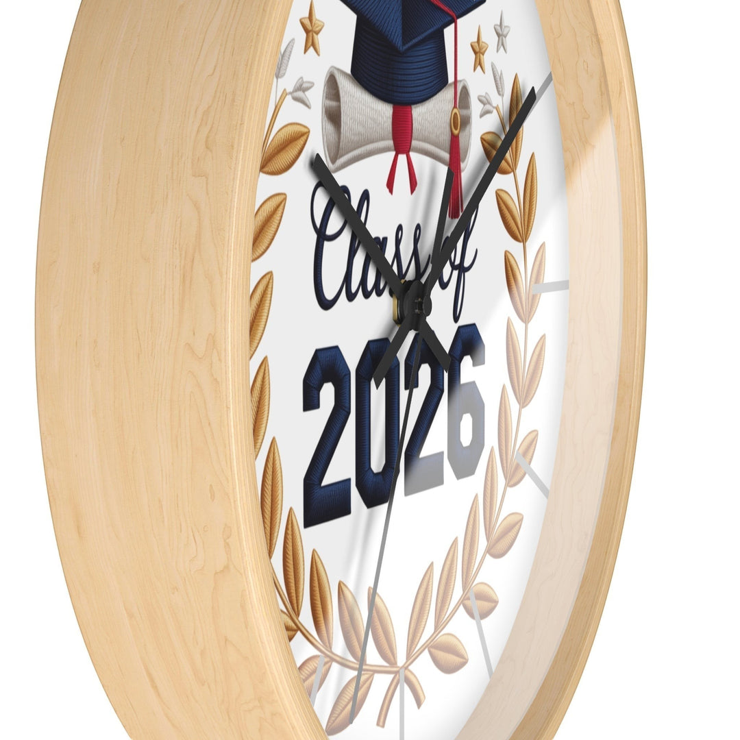 Sea Dragon Dreams Class of 2026 graduation wall clock with a natural wood frame, gold laurel wreath, and cap design.