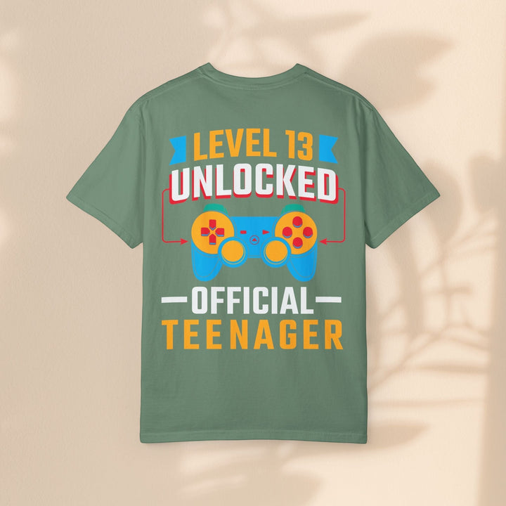 Sea Dragon Dreams green cotton t-shirt with Level 13 Unlocked Official Teenager gamer graphic on the back.