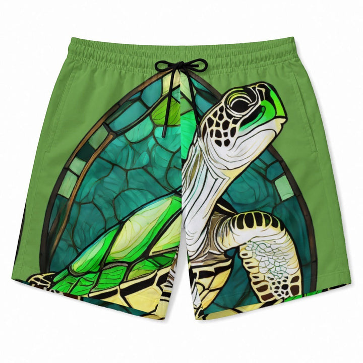 Sea Dragon Dreams men's green Hawaiian shorts featuring a stained-glass style sea turtle print and drawstring waist.