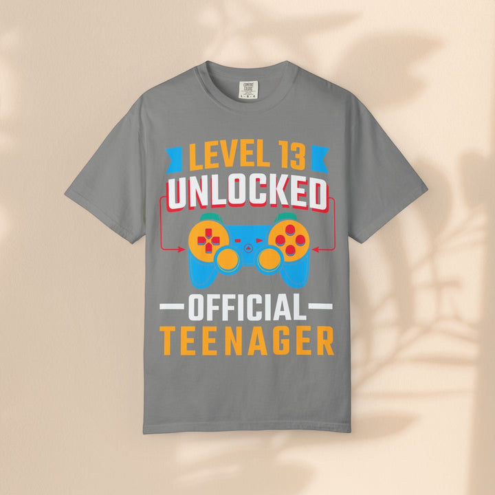 Sea Dragon Dreams grey unisex gamer t-shirt featuring a Level 13 Unlocked Official Teenager graphic with a game controller