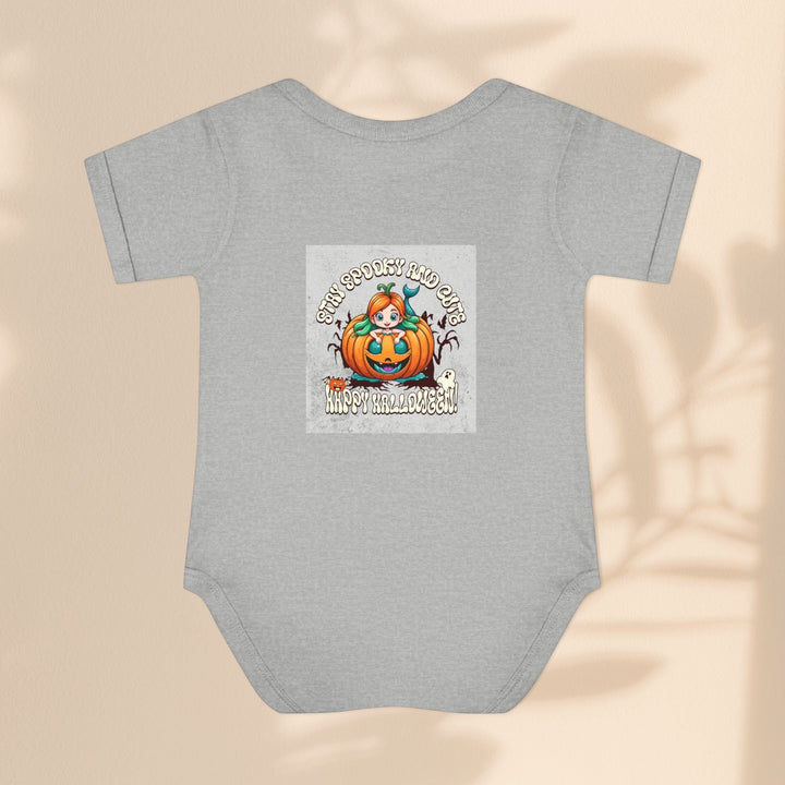 Sea Dragon Dreams infant bodysuit in heather grey cotton featuring a Stay Spooky and Cute pumpkin Halloween graphic