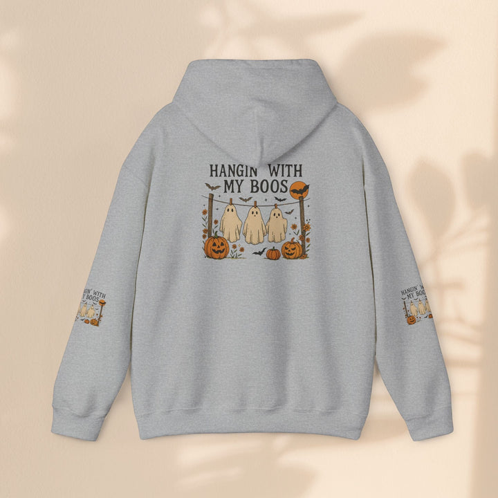 Sea Dragon Dreams grey Halloween hoodie with a ghost and pumpkin graphic on the back and sleeves.