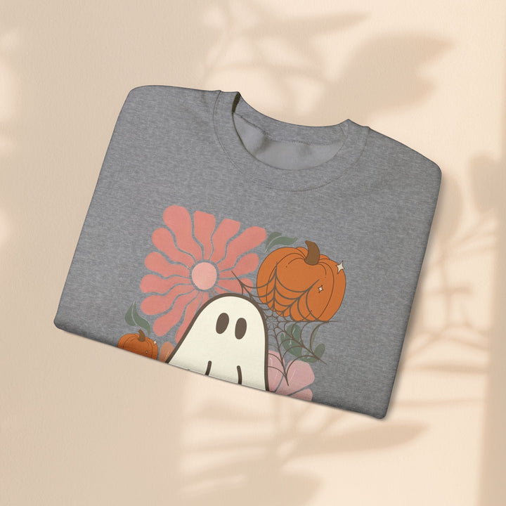 Sea Dragon Dreams grey crewneck sweatshirt featuring a retro ghost, pumpkin, and flower Halloween graphic print.