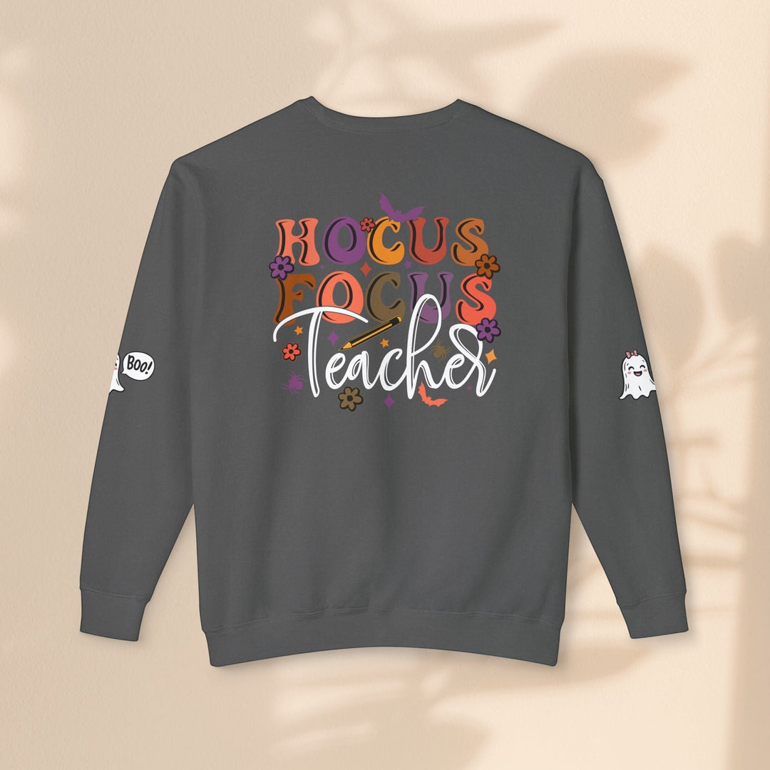 Sea Dragon Dreams grey crewneck sweatshirt with Hocus Focus Teacher Halloween design and ghost sleeve graphics.
