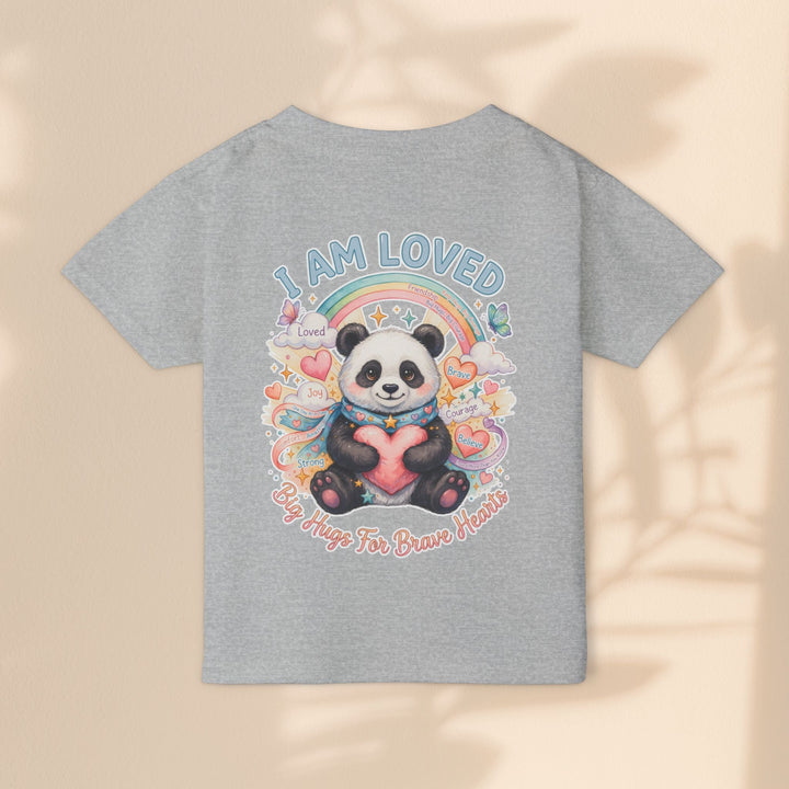 Sea Dragon Dreams toddler t-shirt in grey cotton featuring a Huggie Panda graphic with a rainbow and heart design.