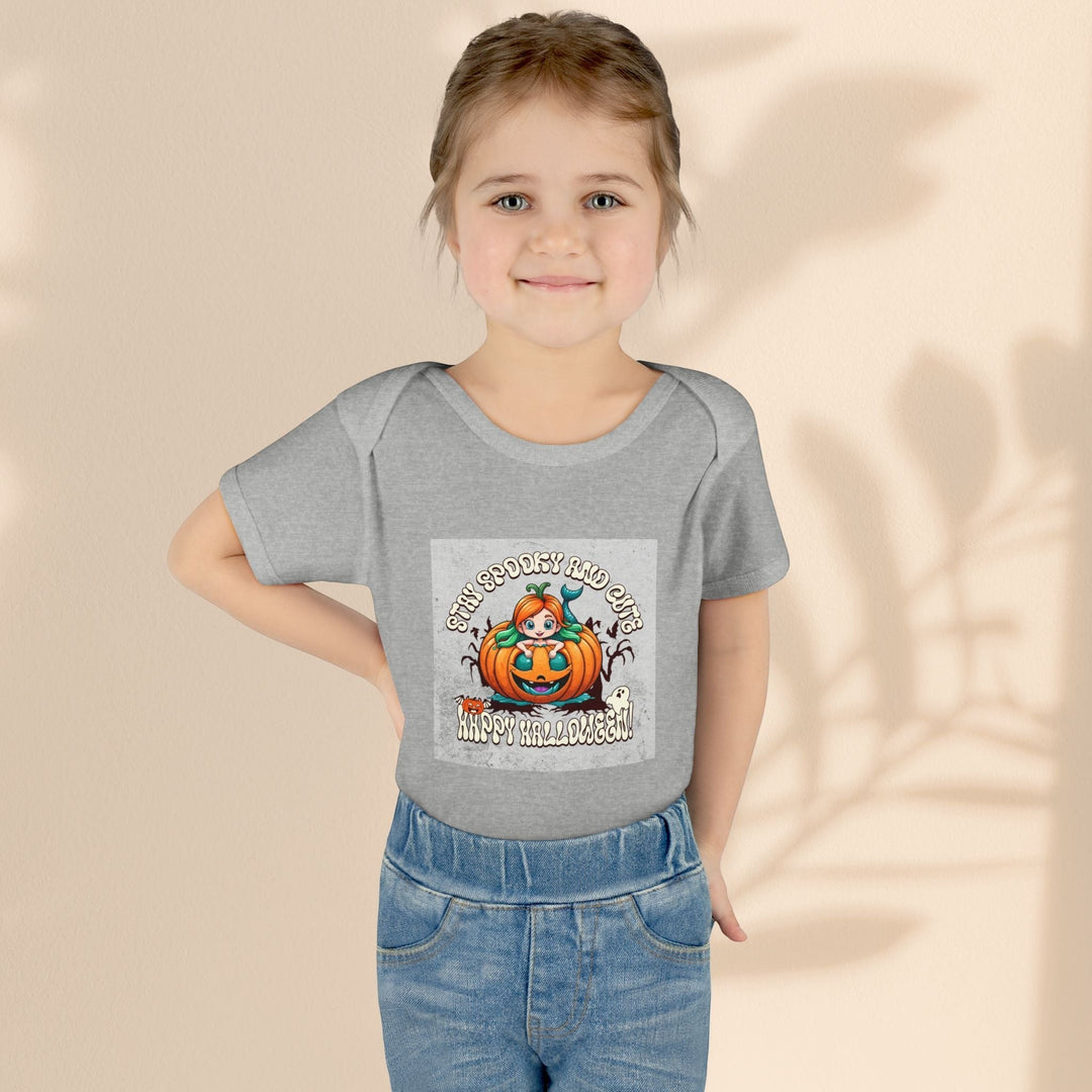 Sea Dragon Dreams grey infant bodysuit featuring a Stay Spooky and Cute pumpkin graphic on a young girl