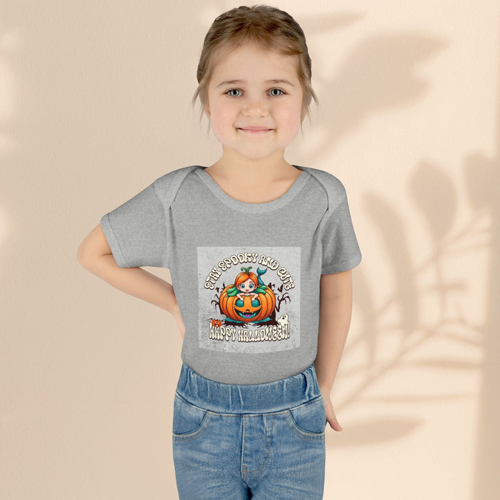 Sea Dragon Dreams grey infant bodysuit featuring a Stay Spooky and Cute pumpkin graphic on a young girl