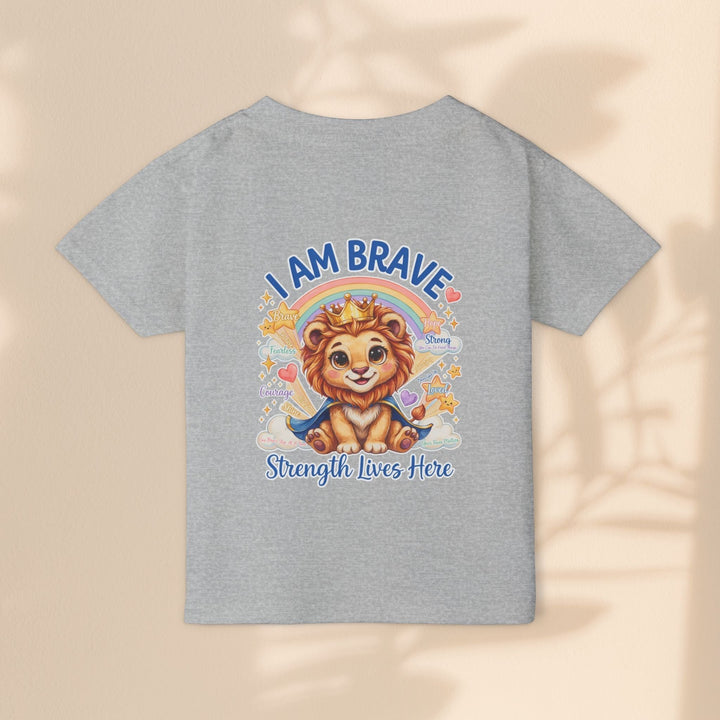 Sea Dragon Dreams toddler t-shirt in grey cotton featuring a cute lion graphic with the text I Am Brave