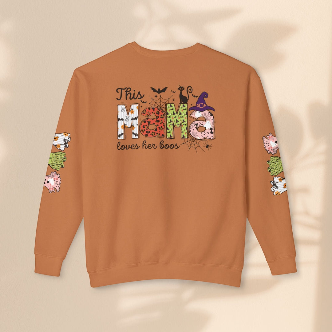Sea Dragon Dreams orange Halloween crewneck sweatshirt with This Mama Loves Her Boos graphic and sleeve print