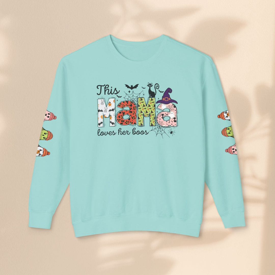 Sea Dragon Dreams light blue crewneck sweatshirt with This Mama Loves Her Boos Halloween graphic and sleeve prints.