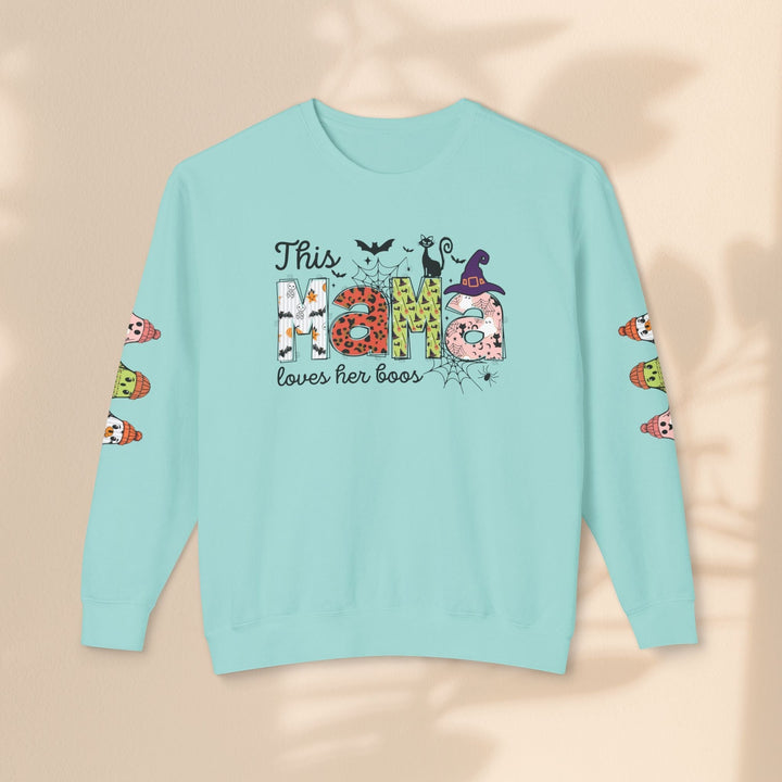 Sea Dragon Dreams light blue crewneck sweatshirt with This Mama Loves Her Boos Halloween graphic and sleeve prints.