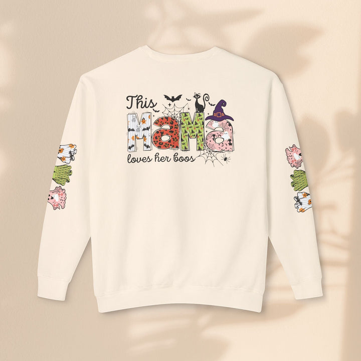 Sea Dragon Dreams cream crewneck sweatshirt with This Mama Loves Her Boos Halloween graphic on back and sleeves.