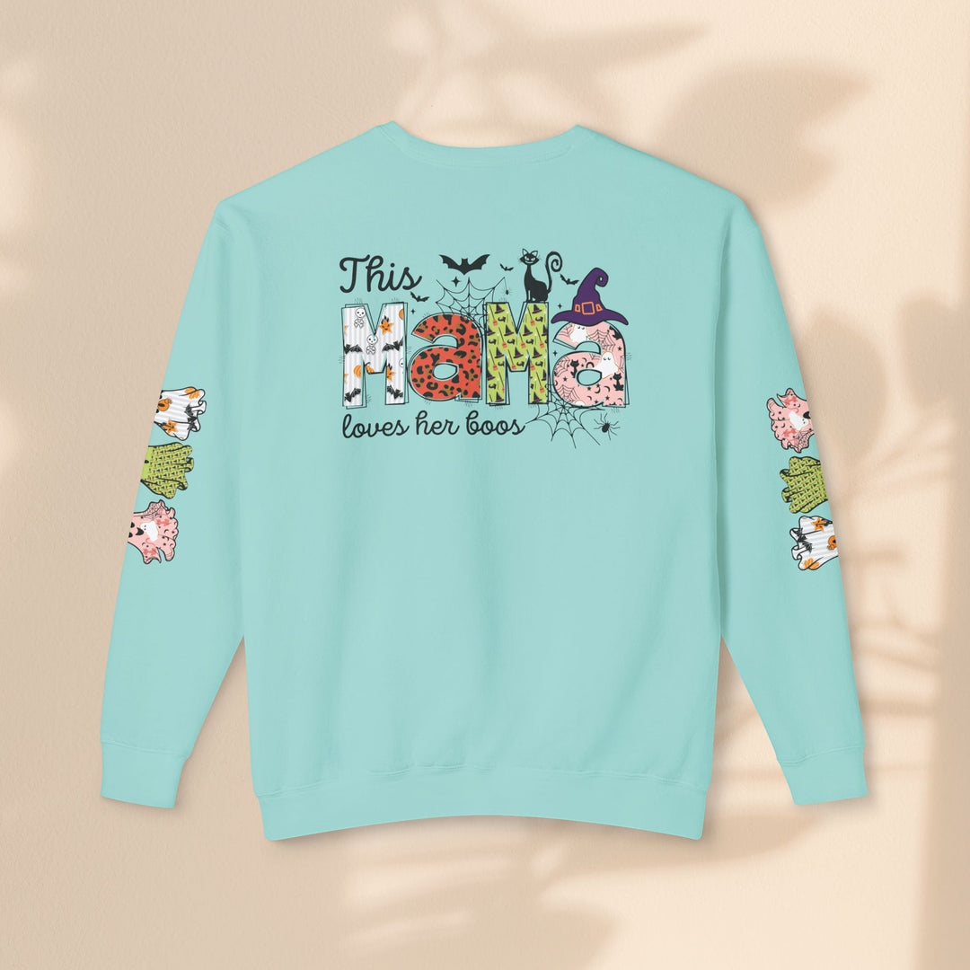 Sea Dragon Dreams light blue crewneck sweatshirt with This Mama Loves Her Boos Halloween print on back and sleeves.
