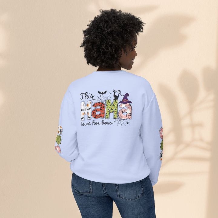 Sea Dragon Dreams light blue crewneck sweatshirt with This Mama Loves Her Boos Halloween graphic on back