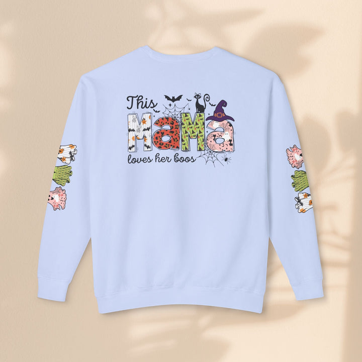 Sea Dragon Dreams light blue crewneck sweatshirt with This Mama Loves Her Boos Halloween graphic on back and sleeves