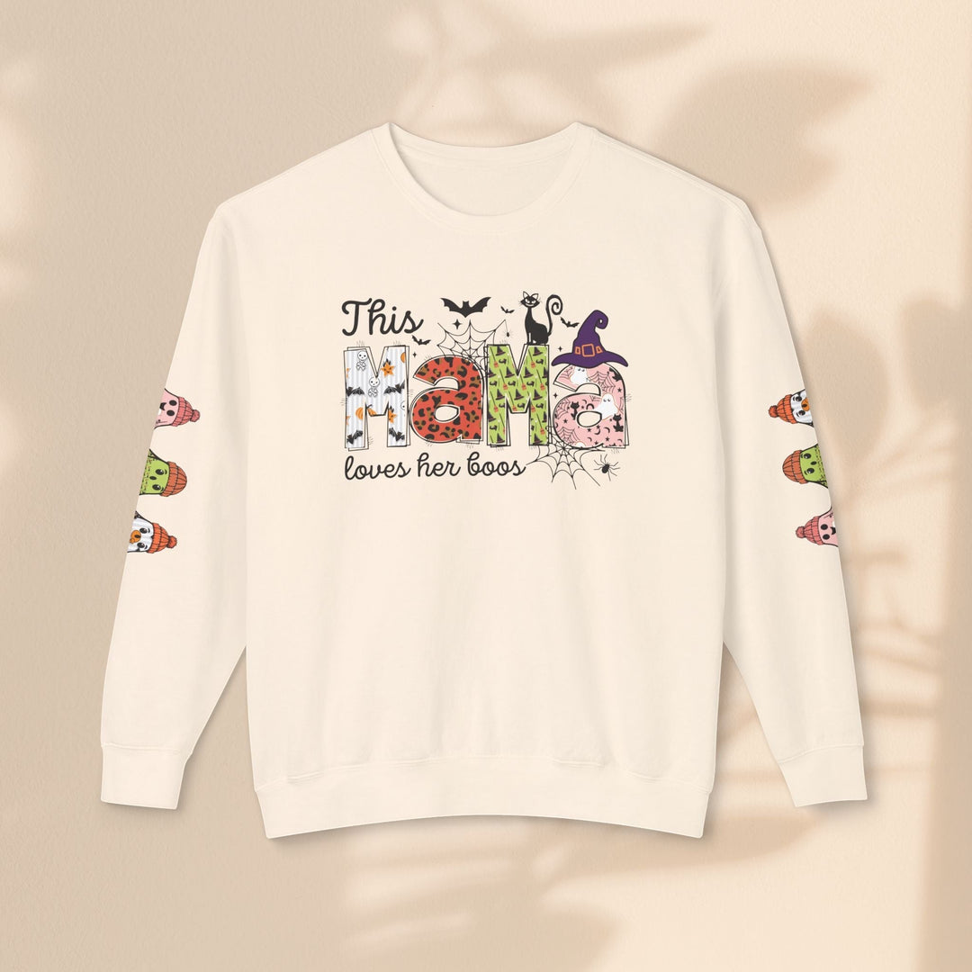 Sea Dragon Dreams cream crewneck sweatshirt with This Mama Loves Her Boos Halloween graphic and ghost sleeve prints.