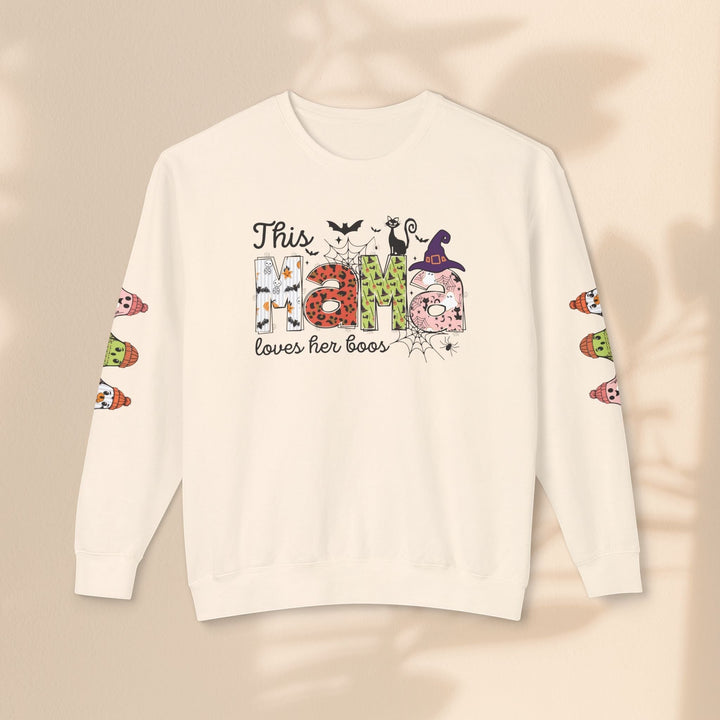 Sea Dragon Dreams cream crewneck sweatshirt with This Mama Loves Her Boos Halloween graphic and ghost sleeve prints.