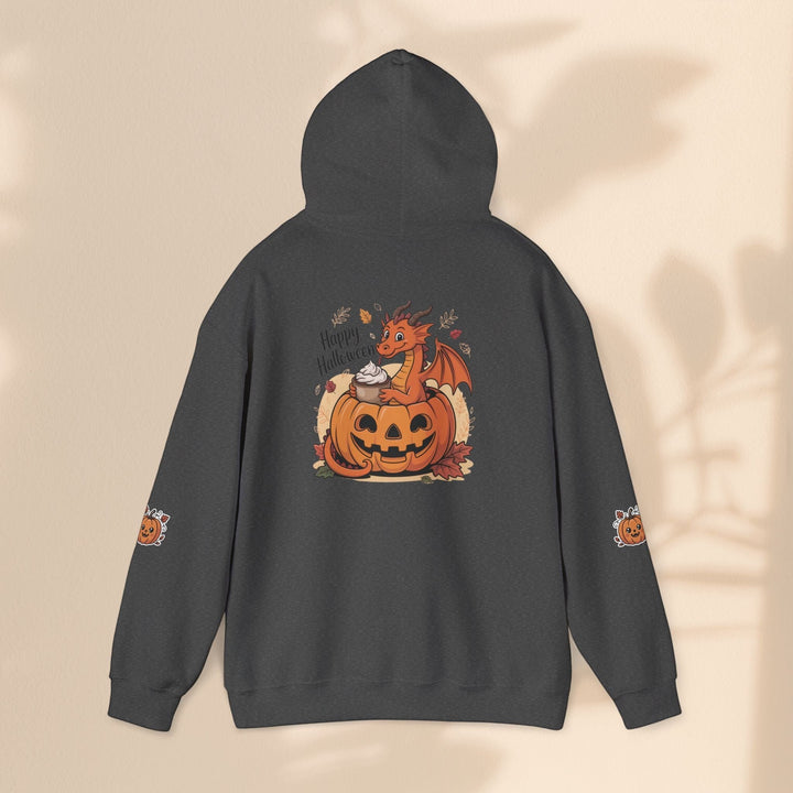 Sea Dragon Dreams dark grey hoodie featuring a playful dragon sitting in a jack-o-lantern with Happy Halloween text.
