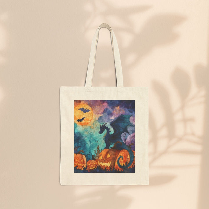 Sea Dragon Dreams cotton canvas tote bag featuring a watercolor dragon and jack-o'-lanterns for Halloween.