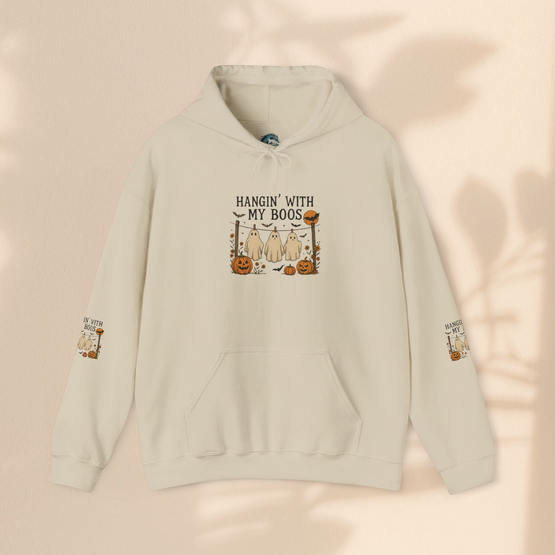 Sea Dragon Dreams cream-colored Halloween hoodie with a ghost and pumpkin graphic and sleeve print.