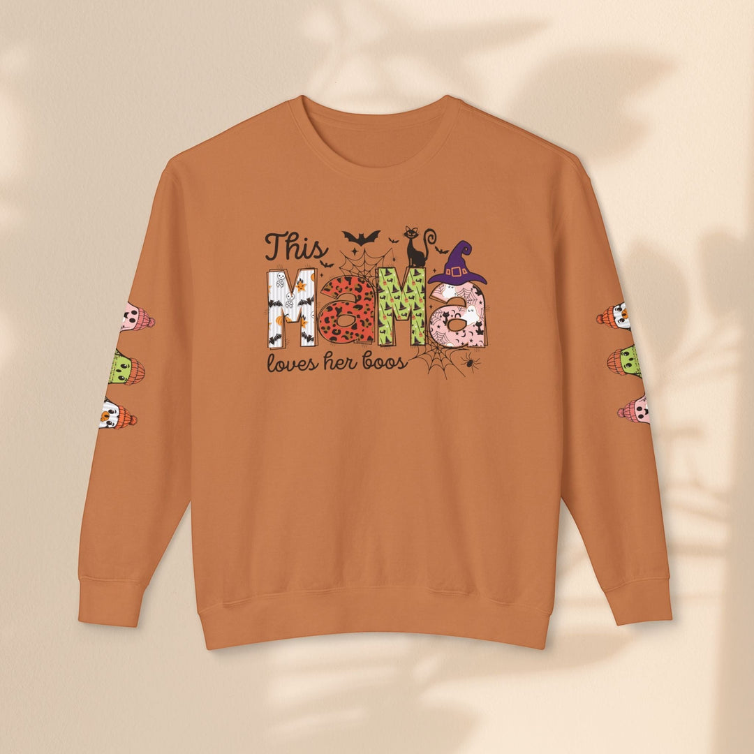Sea Dragon Dreams orange crewneck sweatshirt with This Mama Loves Her Boos Halloween graphic and sleeve ghost prints.