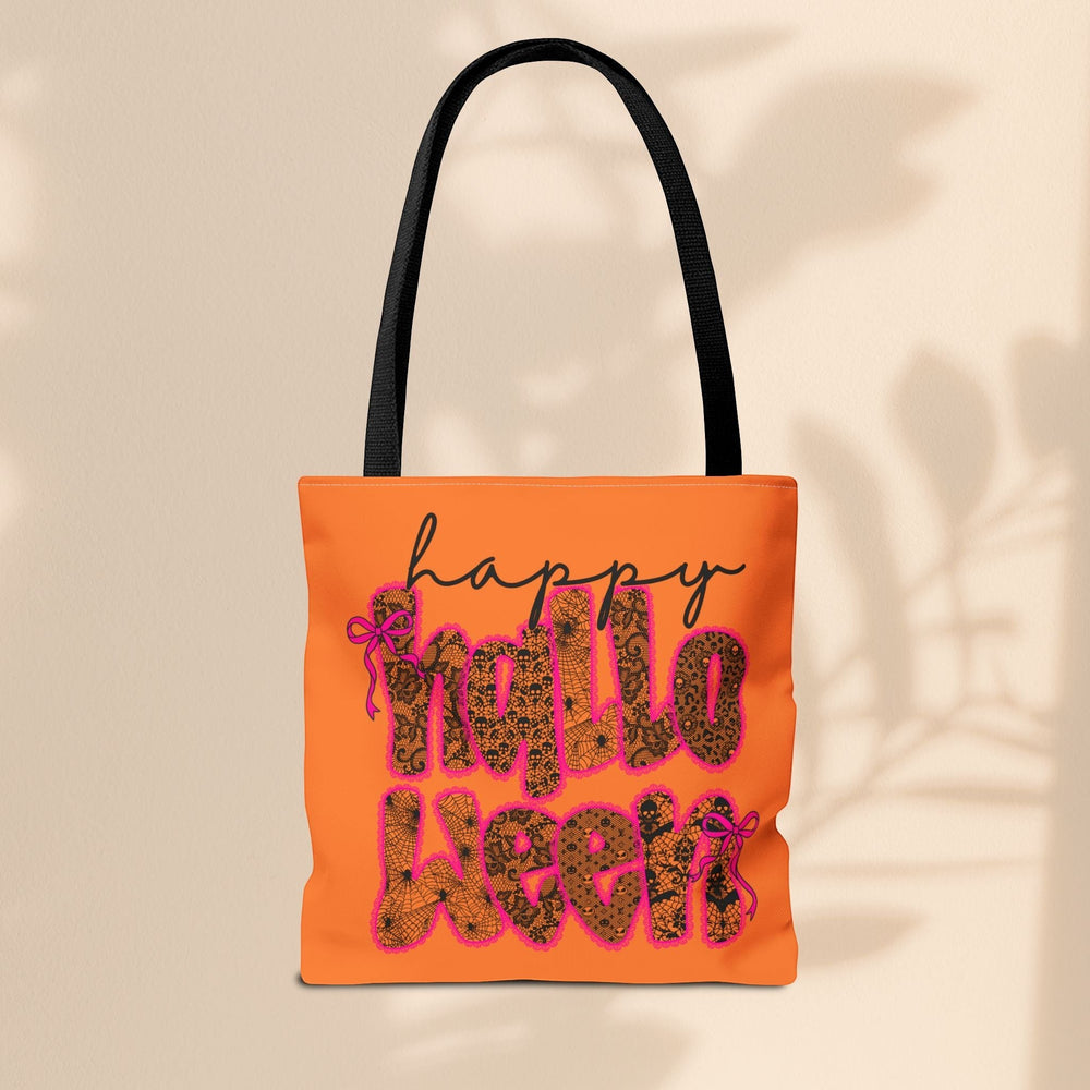 Sea Dragon Dreams Happy Halloween tote bag in orange with black lace-patterned text and black handles.