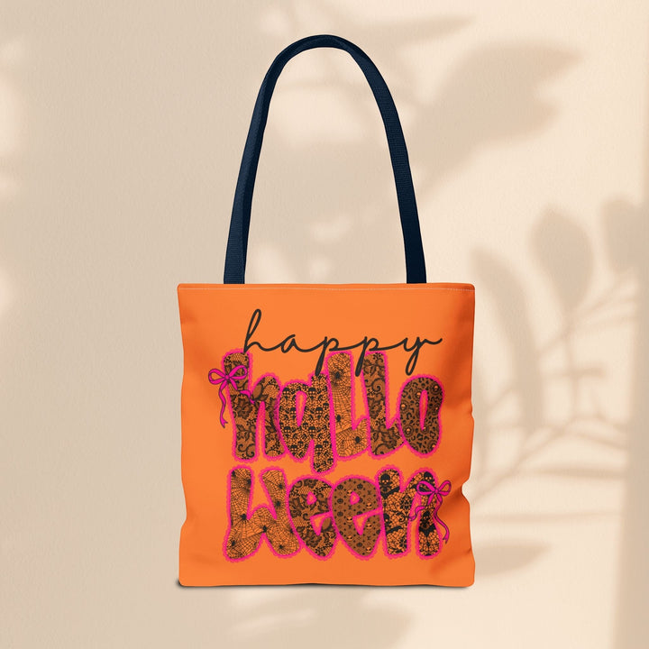 Sea Dragon Dreams Happy Halloween tote bag in orange with black handles and festive patterned lettering.