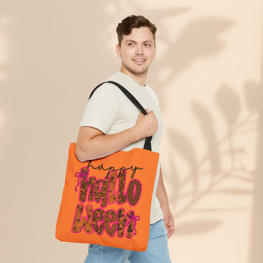 Man carrying a Sea Dragon Dreams orange polyester tote bag with a Happy Halloween leopard print design