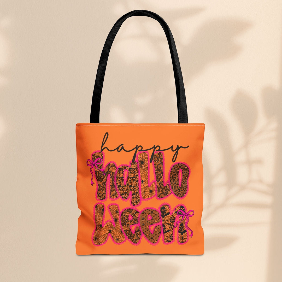 Sea Dragon Dreams Happy Halloween tote bag in orange with black handles and a festive leopard print text design.