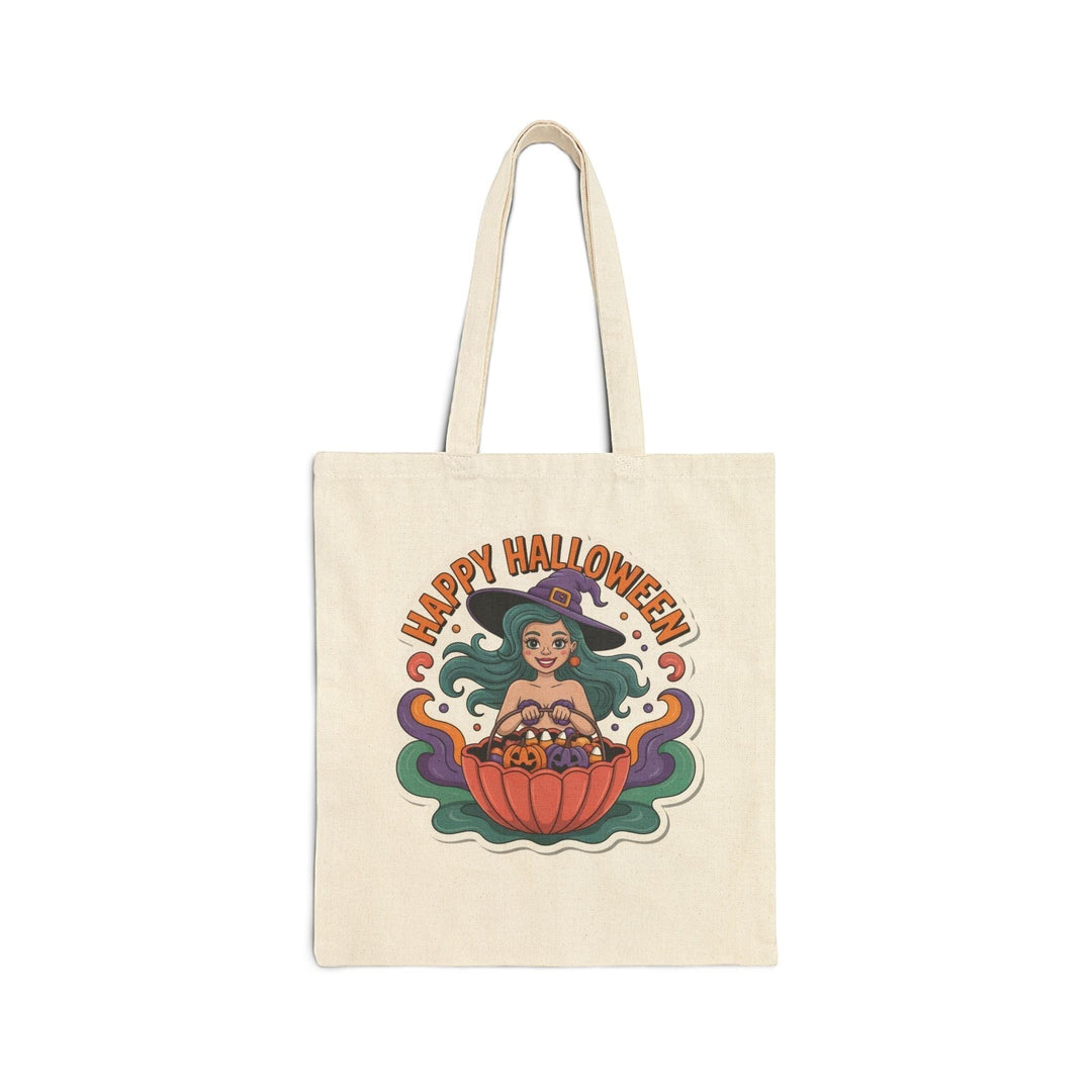 Sea Dragon Dreams cotton canvas tote bag featuring a cartoon witch with teal hair holding a pumpkin bucket for Halloween